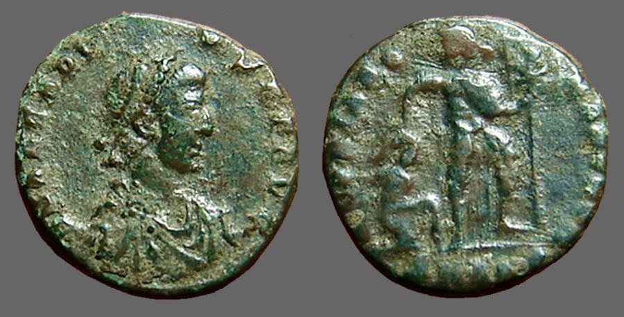 Ancient Coins - Arcadius AE3 Emperor grabbing barbarian by hair, holds labarum in left hand