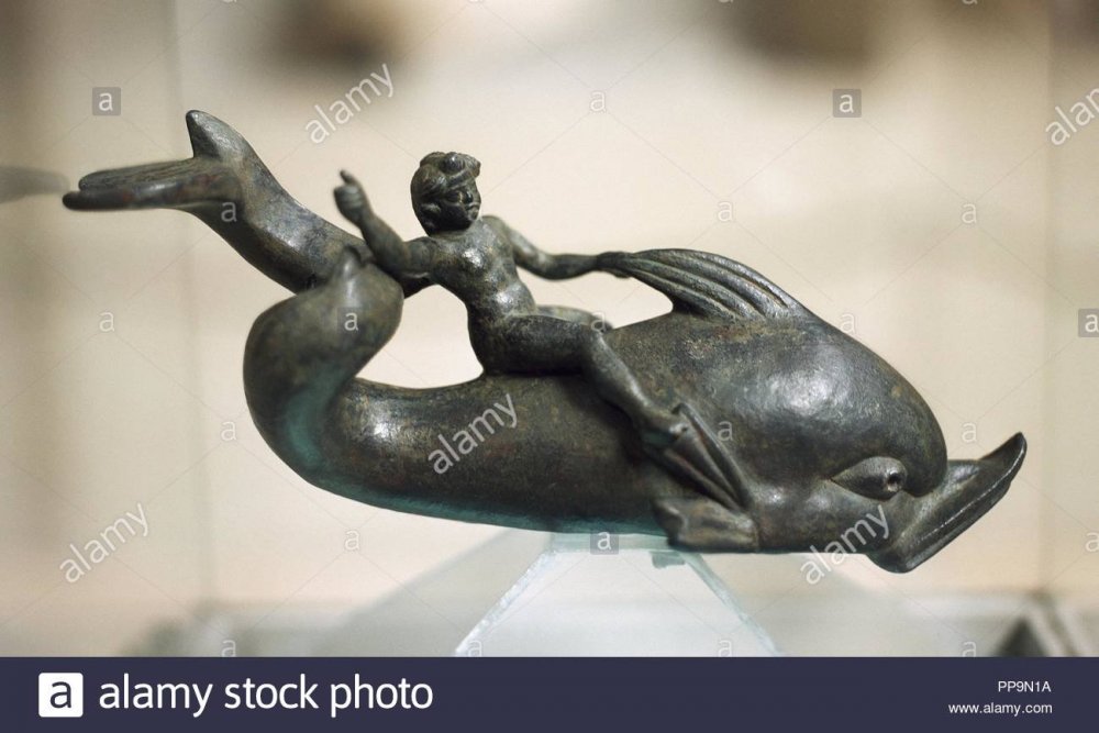 eros-greek-god-of-love-statue-of-eros-mounting-on-a-dolphin-bronze-2nd-century-ad-museum-of-ephesus-seluk-turkey-PP9N1A.jpg