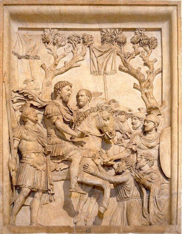 640px-Bas_relief_from_Arch_of_Marcus_Aurelius_Marcus_Aurelius_showing_his_clemence_to_barbarii.jpg