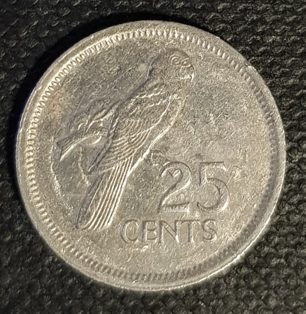 1933457016_Seychelles25centsF.jpg.0c8abf2834edea74d689c4097f7ecadb.jpg