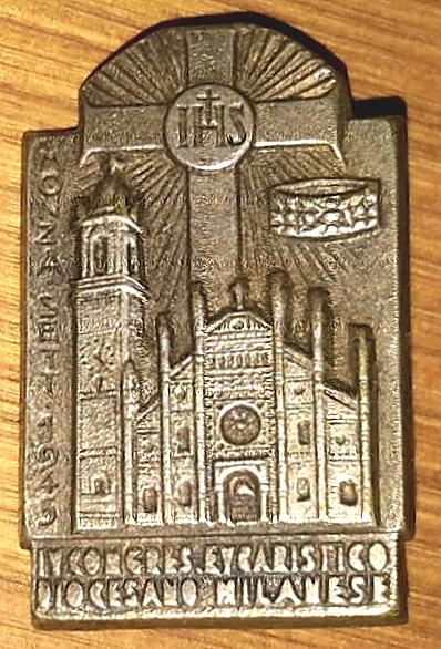 145331888_Spilla.jcongressoeucaristicoMIMessoR.jpg.c458d65191ba396bbe20410589b8a648.jpg